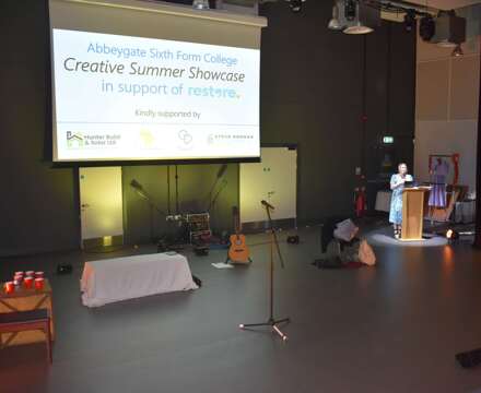 7   Lou Gridley welcomes everyone to the fundraiser for restore at Abbeygate Sixth Form College